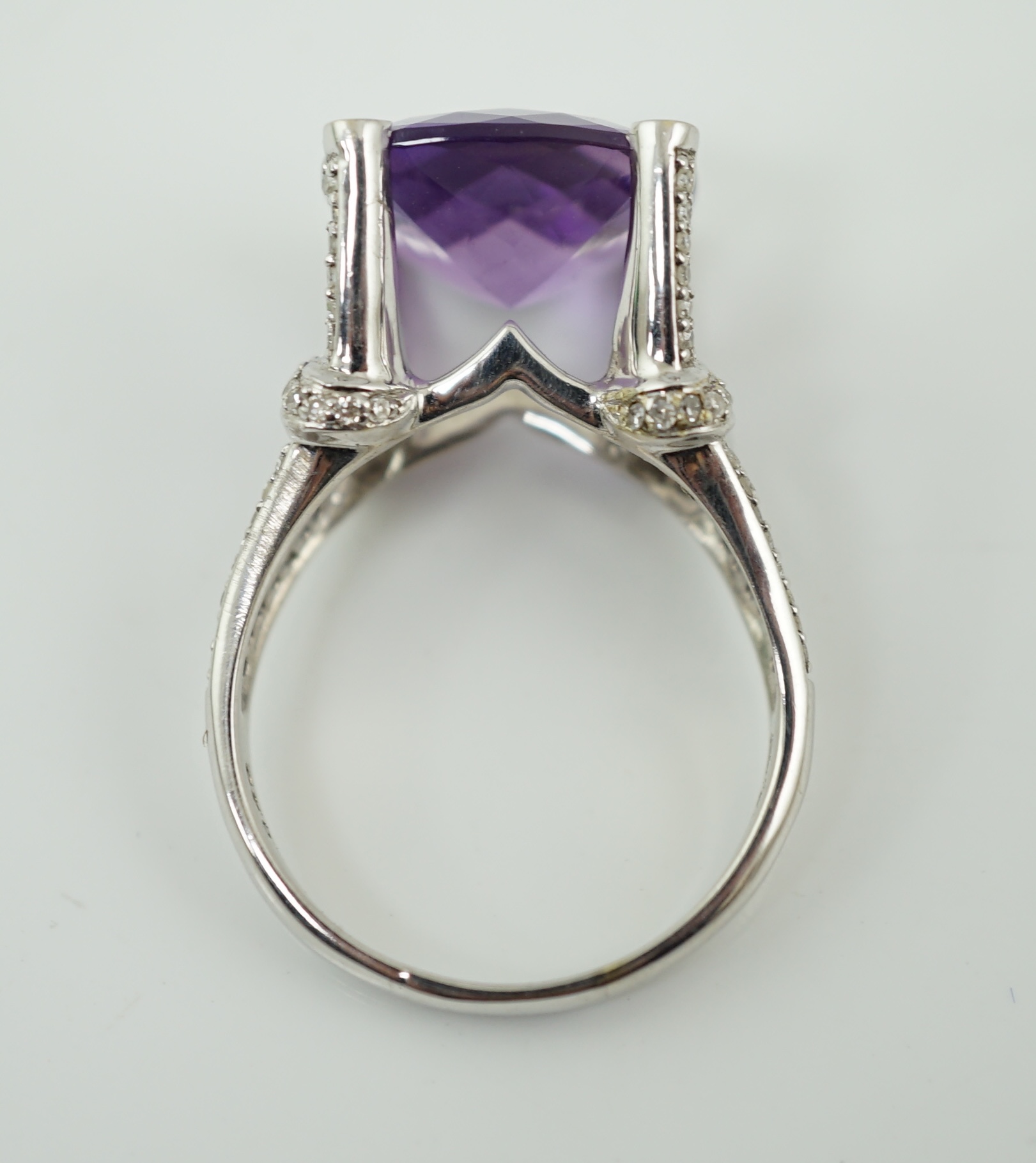 A modern 14k white gold and single stone fancy cushion cut amethyst dress ring